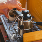 stovetop coffee maker on camp stove